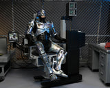 NECA Ultimate Battle Damaged 7" RoboCop with Chair